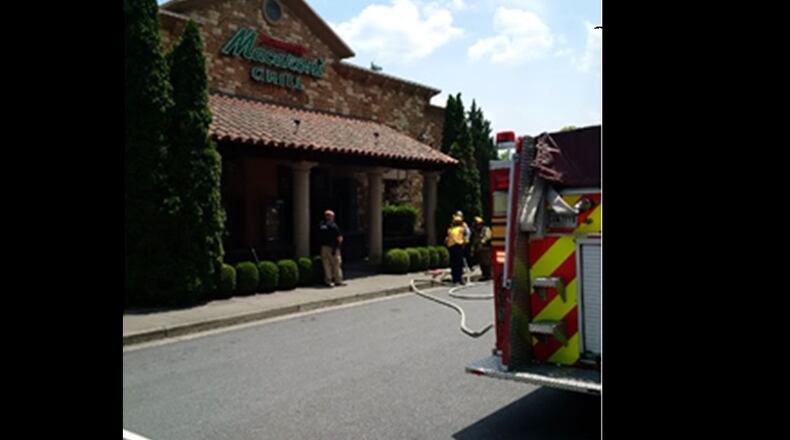 Romano's Macaroni Grill at the Mall of Georgia caught fire Monday afternoon, damaging a wall.