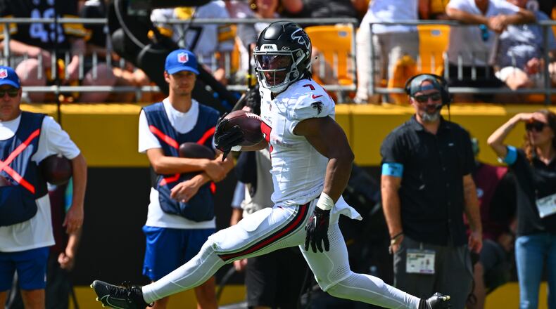 Falcons running back Bijan Robinson runs the ball in for a touchdown during an NFL football game against the Pittsburgh Steelers, Sunday, Sept. 13, 2026, in Pittsburgh. (Justin Berl/AP)