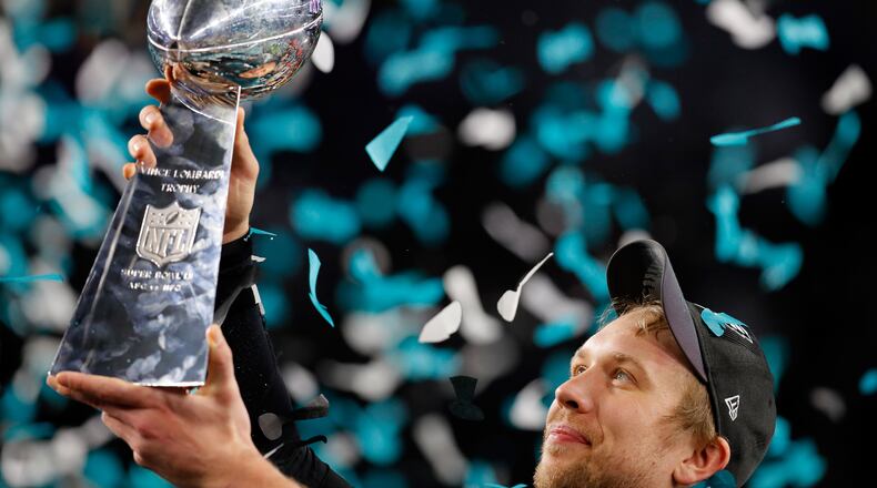 Nick Foles of the Philadelphia Eagles celebrates with the Vince Lombardi Trophy after his teams 41-33 victory over the New England Patriots in Super Bowl LII at U.S. Bank Stadium on February 4, 2018 in Minneapolis, Minnesota. The Philadelphia Eagles defeated the New England Patriots 41-33. (Photo by Kevin C. Cox/Getty Images)