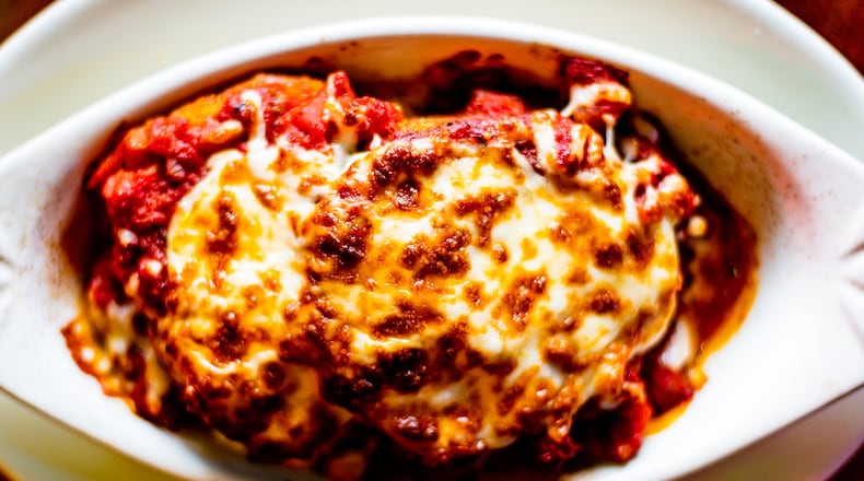 The eggplant parmigiana at Scalini’s Italian Restaurant is believed by many to help pregnant women go into labor. CONTRIBUTED BY HENRI HOLLIS