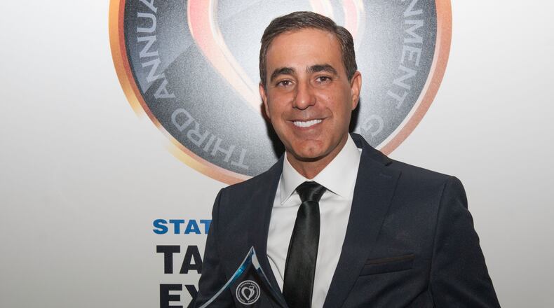 ATLANTA, GA - JANUARY 10: Ozzie Areu receives the "Georgia Highlight" award during the 3rd Annual Georgia Entertainment Gala at Georgia World Congress Center on January 10, 2015 in Atlanta, Georgia. (Photo by Marcus Ingram/Getty Images)