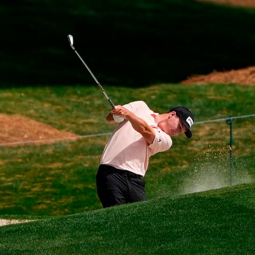 Matt McCarty hits from the 18th fairway during first round of the Truist Championship golf tournament at the Quail Hollow Club, Thursday, May 7, 2026, in Charlotte, N.C. (AP Photo/Chris Carlson)