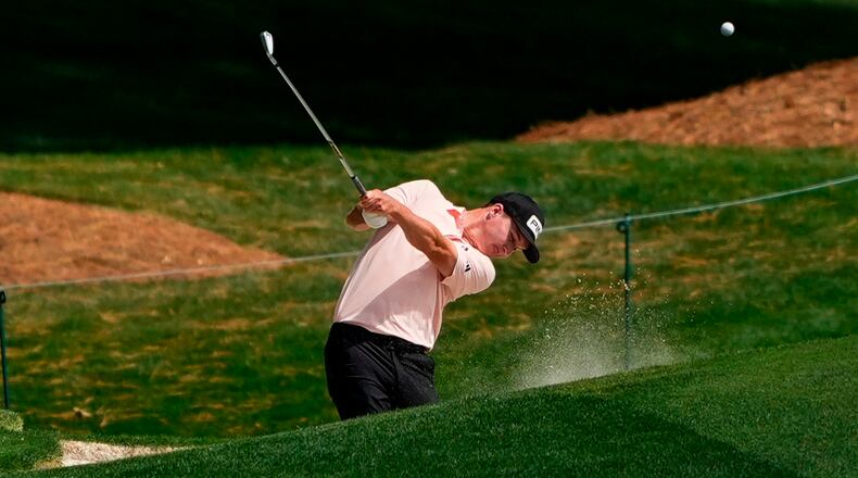 Matt McCarty hits from the 18th fairway during first round of the Truist Championship golf tournament at the Quail Hollow Club, Thursday, May 7, 2026, in Charlotte, N.C. (AP Photo/Chris Carlson)