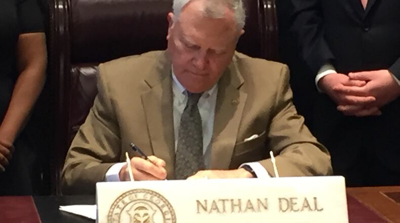 Gov. Nathan Deal signed sexual assault evidence reform legislation into law April 26, 2016.