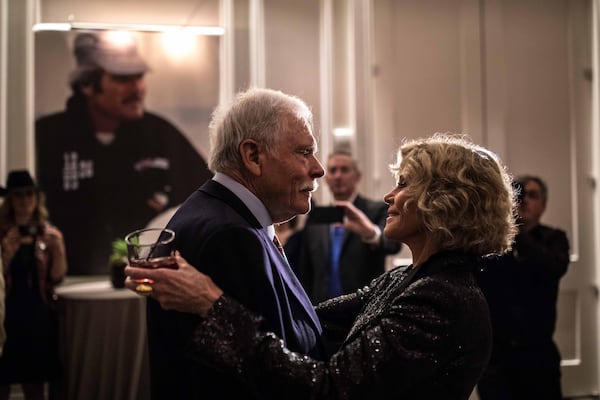 Ted Turner embraces his ex-wife Jane Fonda during his 80th birthday party at the St. Regis Hotel on Saturday, Nov. 17, 2018, in Atlanta. Fonda referred to Turner as her favorite ex-husband. (Branden Camp for the AJC)