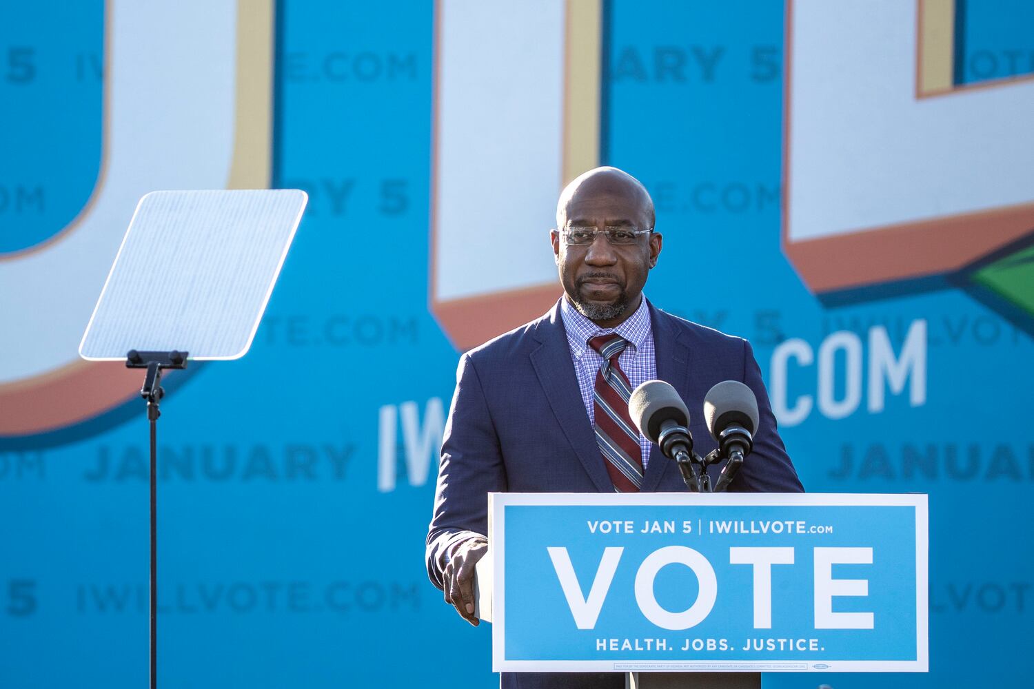 01/04/2021 — Atlanta, Georgia — U.S. Senate Democrat candidate Rev. Raphael Warnock makes remarks during a Georgia Democrat U.S. Senate campaign rally in Atlanta’s Summerhill neighborhood, Monday, January 4, 2021. (Alyssa Pointer / Alyssa.Pointer@ajc.com)