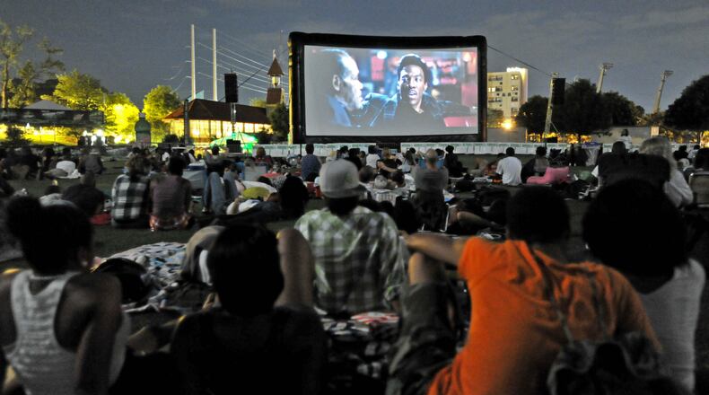 100617 Atlanta : A smaller than usual crowd gathered at Piedmont Park Thursday nigh to watch "Dreamgirls during Screen on the Green Thursday night at Piedmont Park in Atlanta. Screen on the Green resumes on Thursday night with increased security personnel, including on-duty and off-duty Atlanta police officers and staffers from a private security firm, since the showings were temporarily suspended after fights disrupted during the June 3 screening of "Transformers: Revenge of the Fallen" at Piedmont Park in Atlanta. Thursday, June 17, 2010. Hyosub Shin hshin@ajc.com