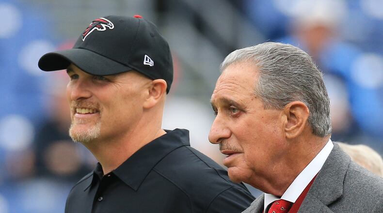 102515 NASHVILLE: -- Falcons head coach Dan Quinn and team owner Arthur Blank look on as the team prepares to play the Titans in a football game on Sunday, Oct. 25, 2015, in Nashville. Curtis Compton / ccompton@ajc.com