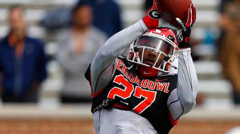 American defensive back Christopher Smith II of Georgia (27) during practice for the Senior Bowl NCAA college football game Wednesday, Feb. 1, 2023, in Mobile, Ala.. (AP Photo/Butch Dill)