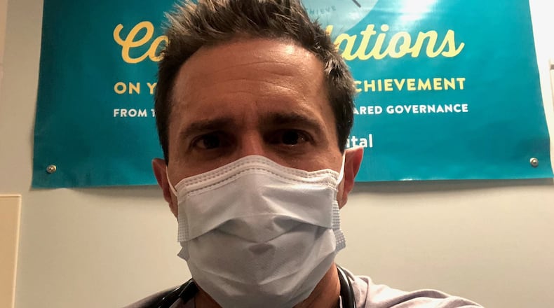 Dr. Jason Stein works in COVID-19 units in Atlanta and Charleston. He spoke to AJC reporter Ariel Hart in November of 2020 about the experience. (Contributed)