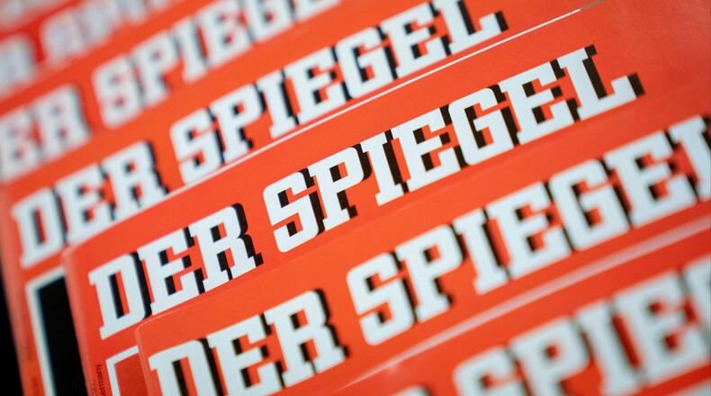 The  German news magazine Der Spiegel said it fired an award-winning jourrnalist for fabricating sources and quotes,