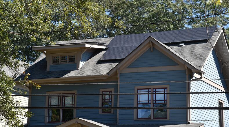 This Brookhaven home is one of the few in the state where the owner used a 2015 state law to finance a solar power unit. Lawmakers are looking at tweaking the law to make it more effective. BRANT SANDERLIN/BSANDERLIN@AJC.COM