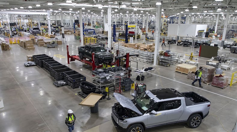 RT1 trucks being assembled and tested on April 14, 2021, before the new Rivian plant fully opened in Normal, Illinois. Rivian also will build a $5 billion plant in Georgia to make electric vehicles. (Brian Cassella/Chicago Tribune/TNS)