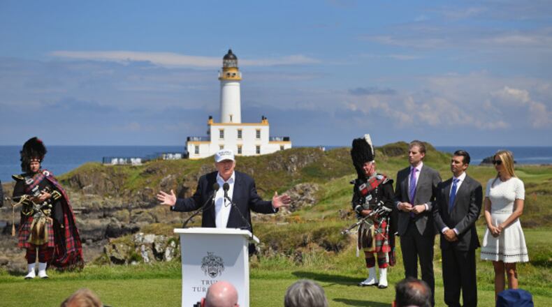 Presumptive Republican nominee for US president Donald Trump gives press conference on the 9th tee at his Trump Turnberry Resort surrounded by his family Eric Trump,Donald Trump junior and Ivanka Trump on June 24, 2016 in Ayr, Scotland. Mr Trump arrived to officially open his golf resort which has undergone an eight month refurbishment as part of an investment thought to be worth in the region of two hundred million pounds. (Photo by Jeff J Mitchell/Getty Images)