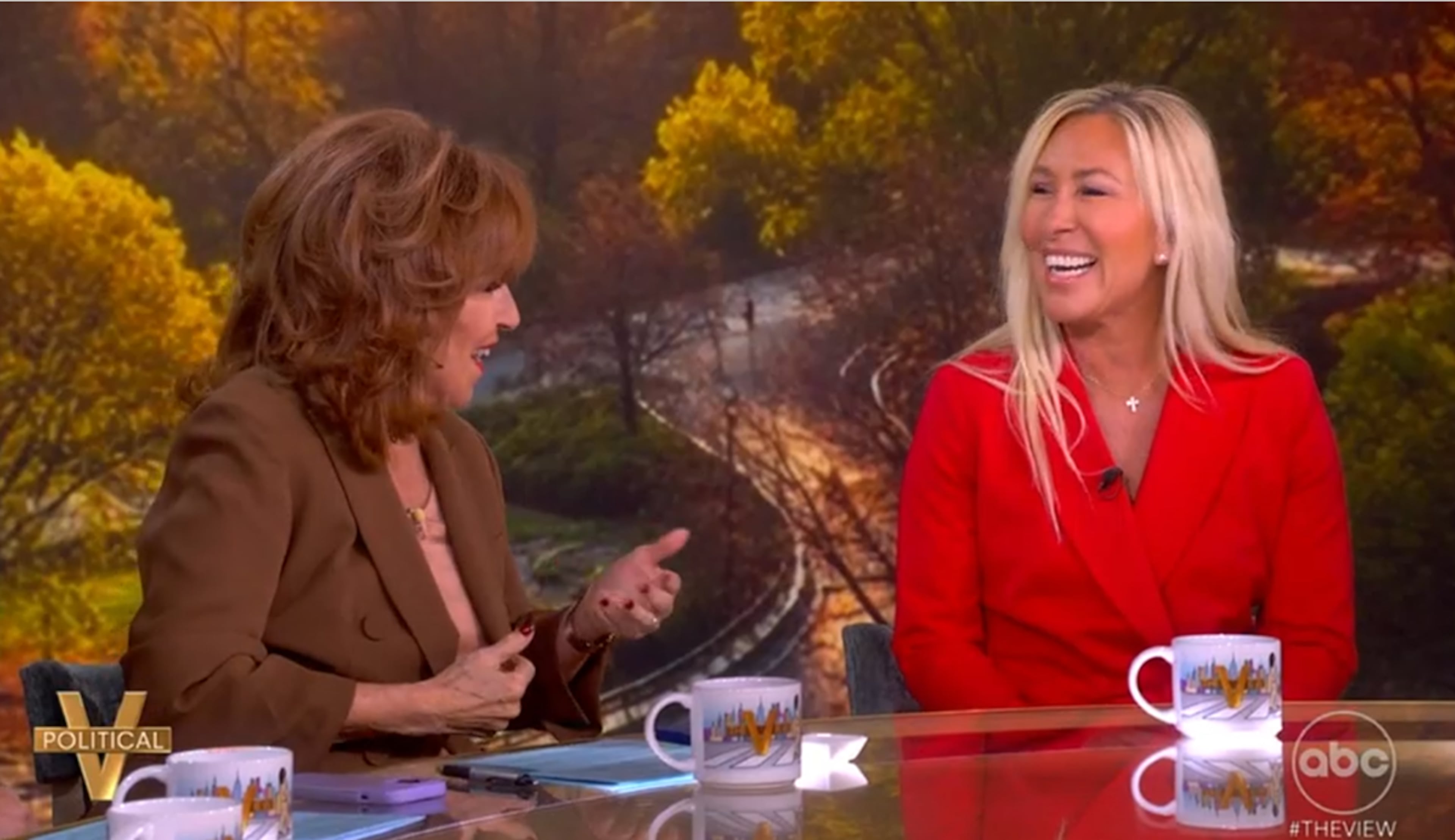 U.S. Rep. Marjorie Taylor Greene (right) shares a laugh with Joy Behar during "The View" on Tuesday. (ABC)