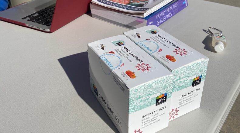 While practicing social distancing, Good Samaritan in Norcross is distributing hand sanitizer to local families. CONTRIBUTED