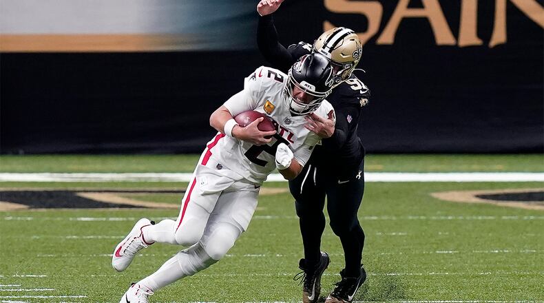 Saints defensive end Trey Hendrickson (91) sacks Falcons quarterback Matt Ryan (2) in the first half Sunday, Nov. 22, 2020, in New Orleans. (Butch Dill/AP)