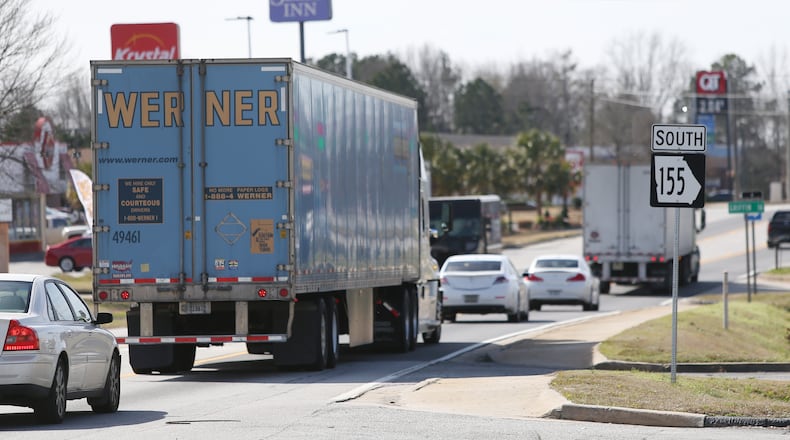 Traffic backups at exit 216 off I-75, which intersects with Ga. 155 in McDonough, are part of the congestion in Henry County’s distribution center corridor. EMILY HANEY / emily.haney@ajc.com