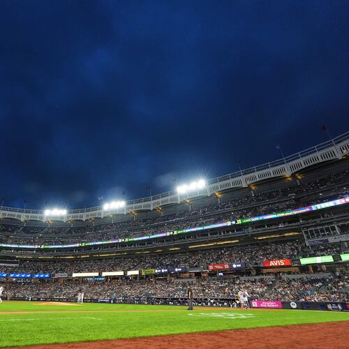 Play is stopped after lights lost power during the first inning of a baseball game between the New York Yankees and the St. Louis Cardinals Wednesday, Aug. 5, 2026, in New York. (AP Photo/Frank Franklin II)