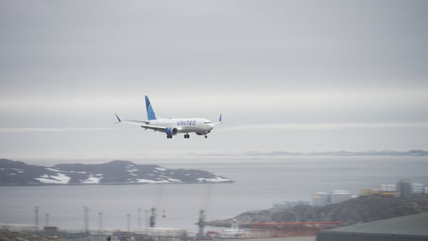 The first direct scheduled flight from Newark in the USA to Nuuk lands at the airport in Nuuk, Greenland, on Saturday, June 14, 2025. (AP Photo/Kwiyeon Ha)