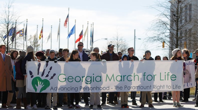 Marchers line up Friday on Capitol Avenue for the Georgia March for Life in downtown Atlanta. (REANN HUBER/REANN.HUBER@AJC.COM)