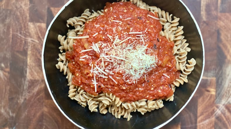 Pasta sauce made from fresh tomatoes tastes lighter, brighter, and is more nutritious than jarred sauce.
(Kellie Hynes for The Atlanta Journal-Constitution)