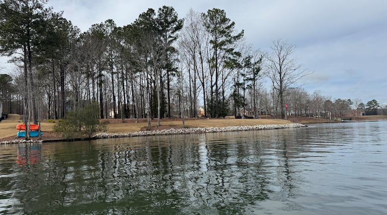 Missing boater Gary Jones' 11-foot fishing boat was found floating here on Lake Oconee on the evening of Feb. 8. (Joe Kovac Jr. / AJC)