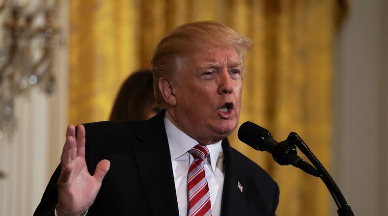 WASHINGTON, DC - FEBRUARY 13: U.S. President Donald Trump speaks during a reception in the East Room of the White House February 13, 2018 in Washington, DC. President Trump and first lady Melania Trump hosted a reception to celebrate the National African American History Month with leaders and representatives from the African American community. (Photo by Alex Wong/Getty Images)