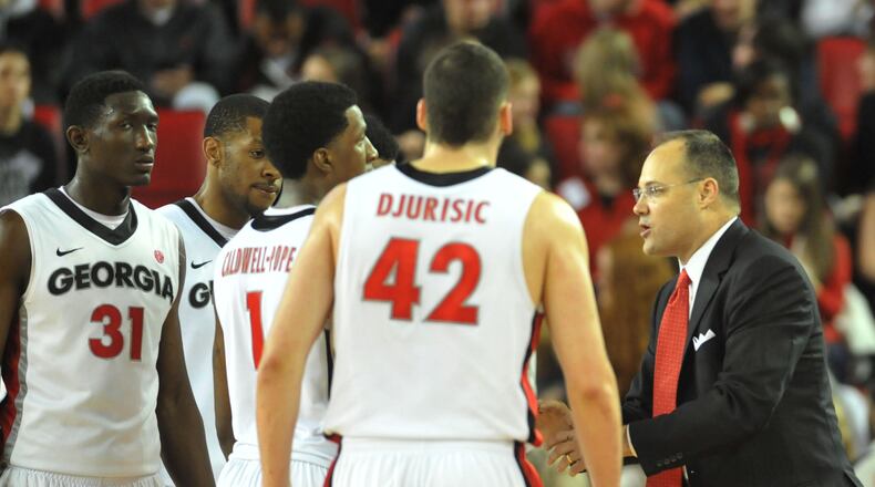 JANUARY 23, 2013 ATHENS, GA UGA head coach Mike Fox talkswith the team during a time out against Florida during second half action at Stegeman Coliseum Wednesday Januasry 23, 2013. KENT D. JOHNSON / KDJOHNSON@AJC.COM