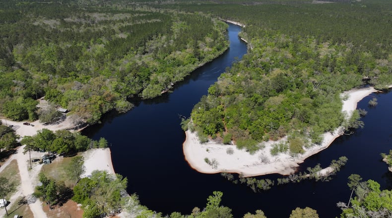 Drone photograph shows the St. Marys River in Macclenny, Florida, Wednesday, Mar. 20, 2024. The St. Marys River serves as the border between Georgia (right side) and Florida (left side). The 130-mile St. Marys River is a blackwater river located in southeast Georgia and is bordered by the Satilla River Basin to the north and the Suwannee River Basin to the west. (Hyosub Shin / Hyosub.Shin@ajc.com)