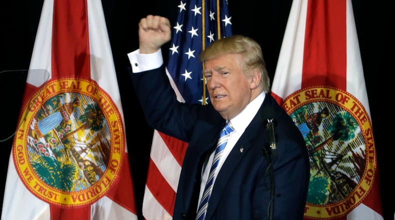 Republican presidential candidate Donald Trump pumps his fist after a campaign speech, Monday, Nov. 7, 2016, in Sarasota, Fla. (AP Photo/Chris O'Meara)