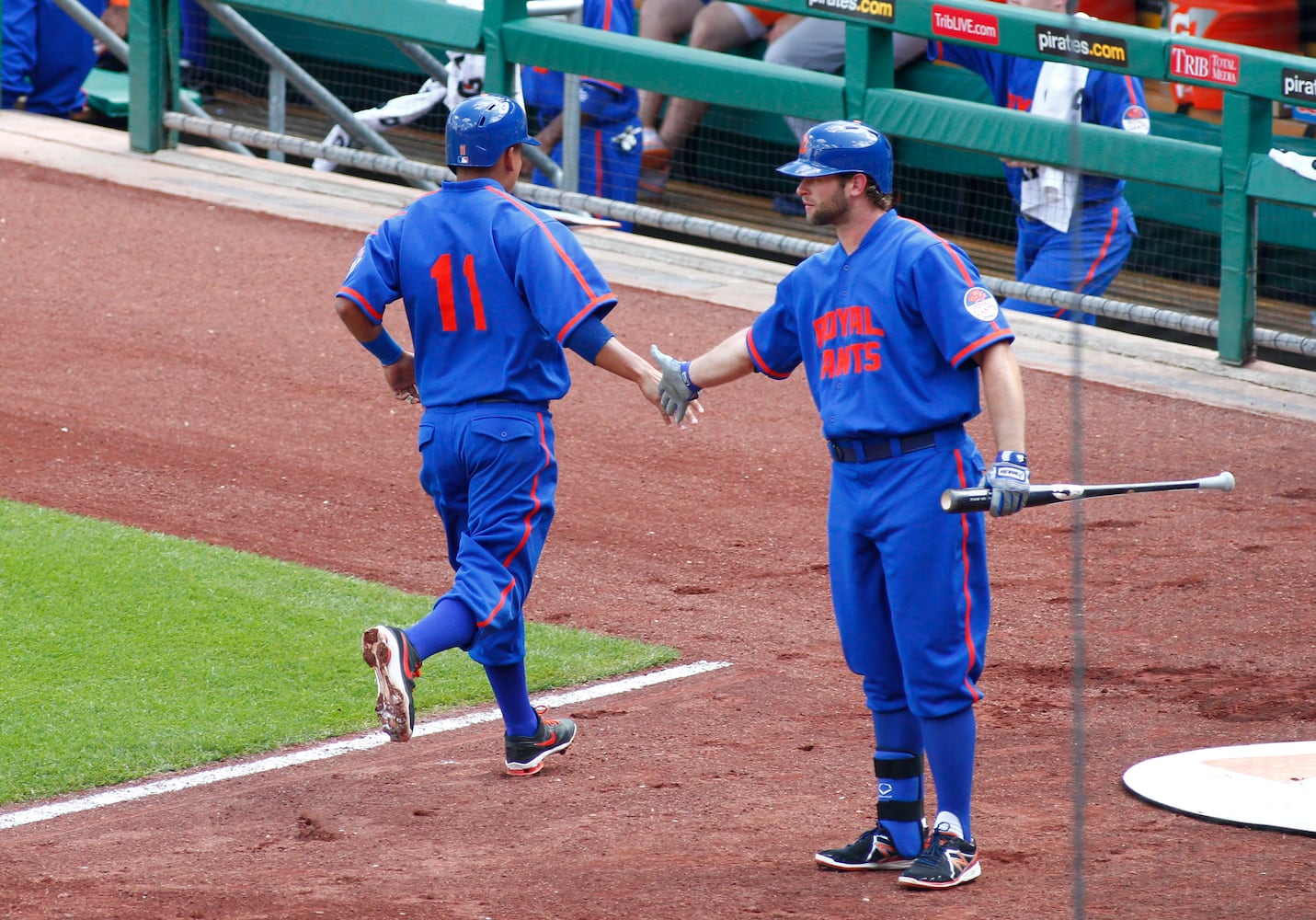 Bright blue and bright orange collide on Mets uniforms