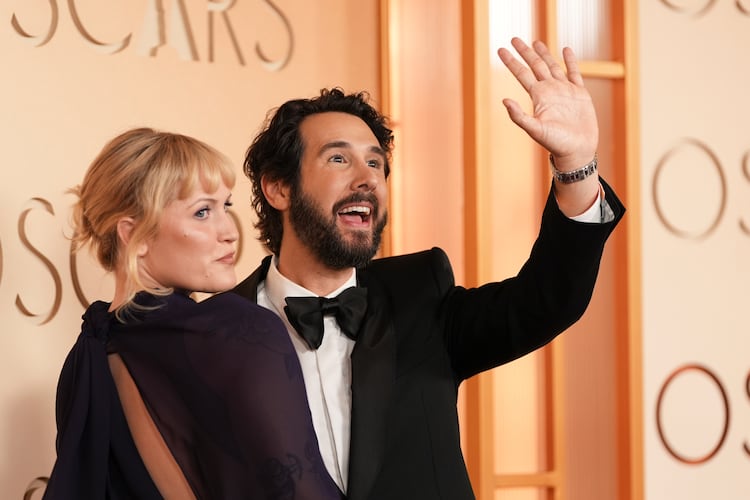 Natalie McQueen (left) and Josh Groban arrive at the Oscars on Sunday, March 15, 2026, at the Dolby Theatre in Los Angeles. (Gregory Bull/AP)