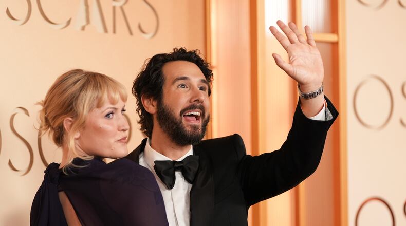 Natalie McQueen (left) and Josh Groban arrive at the Oscars on Sunday, March 15, 2026, at the Dolby Theatre in Los Angeles. (Gregory Bull/AP)