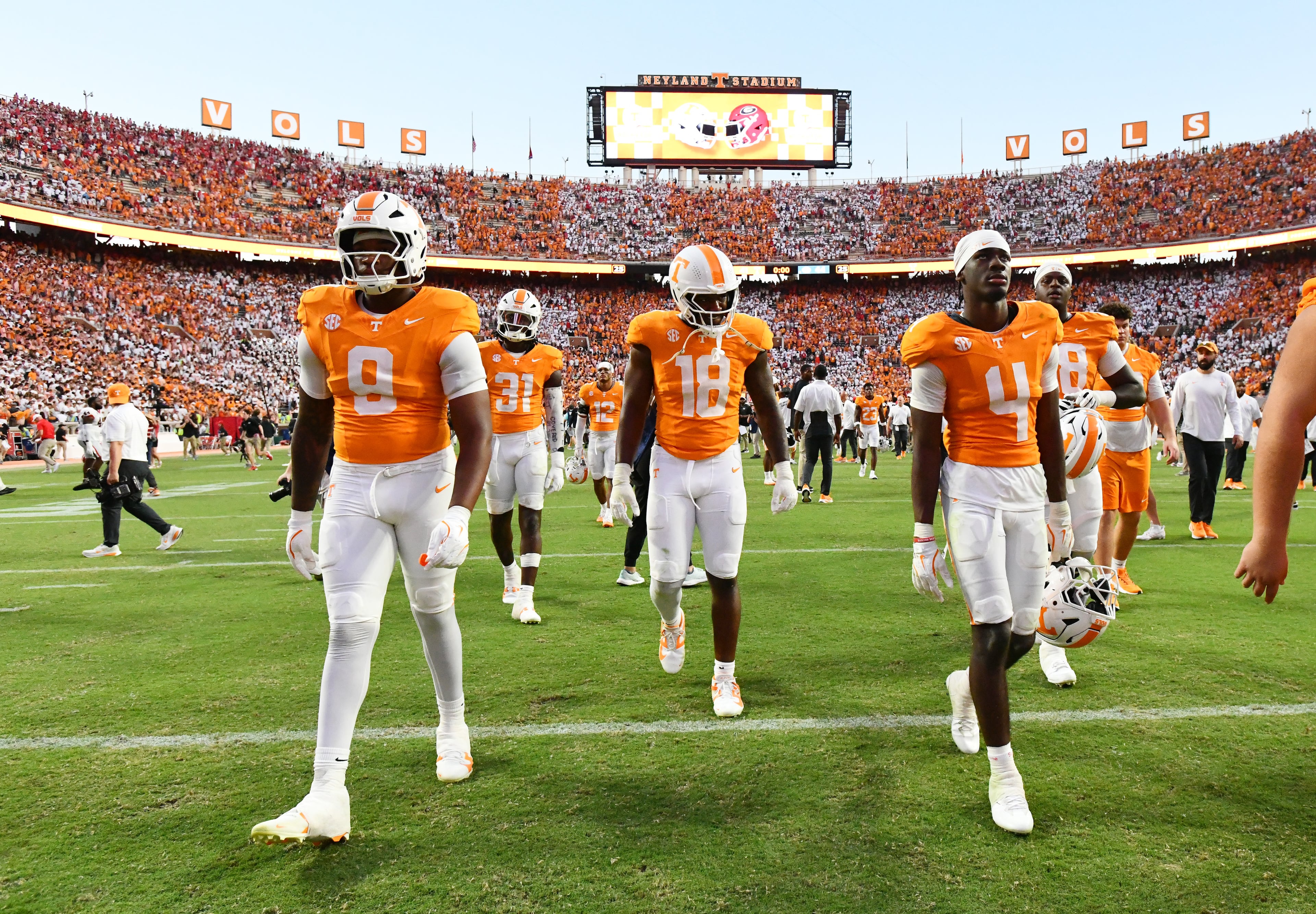 Tennessee players leave the football field after Georgia beat Tennessee during overtime in an NCAA football game at Neyland Stadium, Saturday, September 13, 2025, in Knoxville, Tenn. Georgia won 44-41 over Tennessee in overtime.