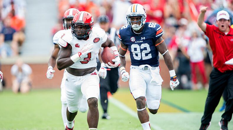 AUBURN, AL - SEPTEMBER 12: Linebacker Joel McCandless #3 of the Jacksonville State Gamecocks runs the ball down the sidelines after intercepting the ball during their game against the Auburn Tigers on September 12, 2015 at Jordan-Hare Stadium in Auburn, Alabama. (Photo by Michael Chang/Getty Images)