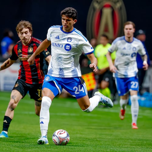 CF Montreal defender Efrain Morales (24) controls the ball against Atlanta United forward Saba Lobjanidze, center left, during the first half of an MLS soccer match, Saturday, May 2, 2026, in Atlanta. (AP Photo/Erik S. Lesser)