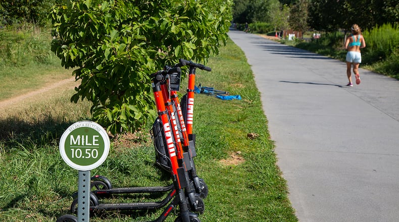 An Atlanta woman claims faulty brakes on an Uber scooter she was riding caused her to be thrown from the device and suffer serious injuries.  (Photo by Phil Skinner)