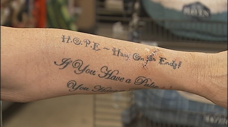 Dorina Groves' latest inspirational tattoo, H.O.P.E., which is an acronym for Hold On Pain Ends, wasn't complete.