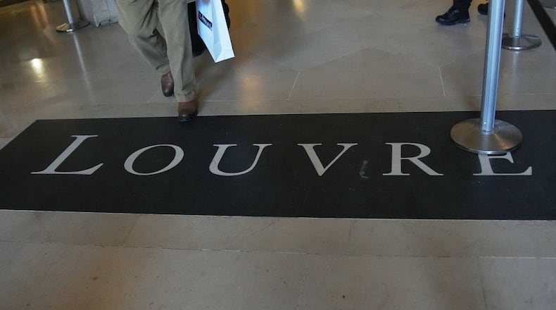 FILE - A carpet at Le Louvre museum, Wednesday, Nov. 19, 2025 in Paris. (AP Photo/Christophe Ena, File)