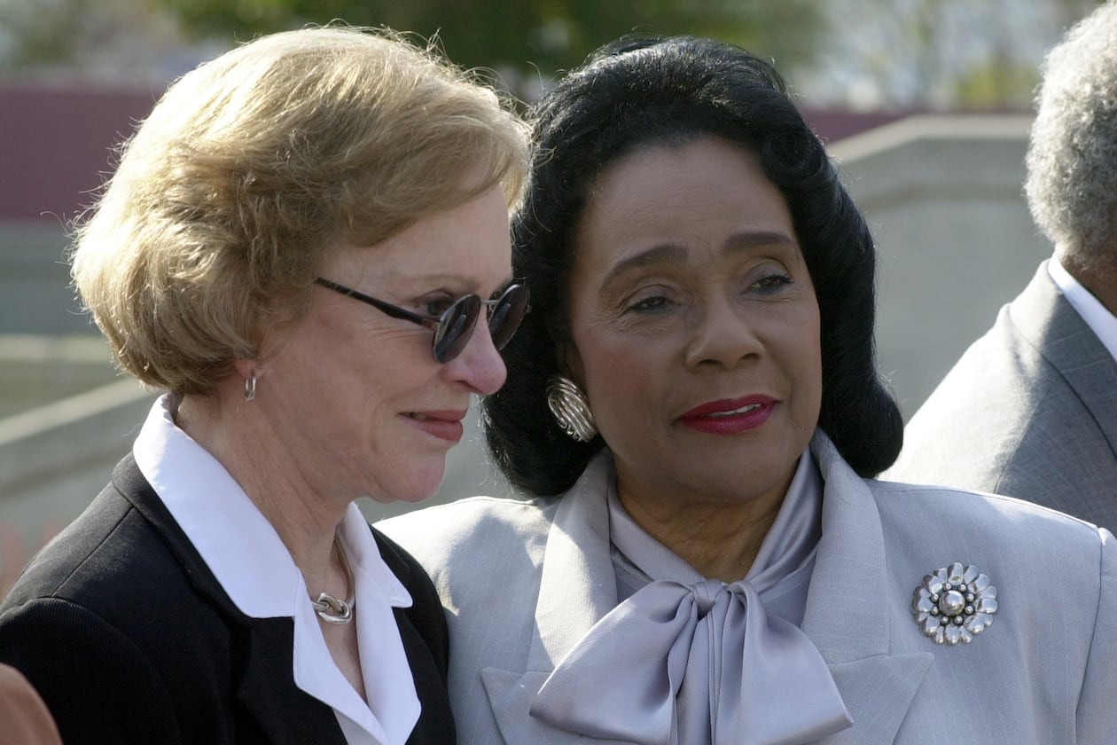 ATLANTA, GA. - Former U.S. first lady Rosalynn Carter (left) chats with Coretta Scott King (right) following ceremonies marking the 20th anniversary of the Martin Luther King, Jr. National Historic site and Preservation District on Auburn Ave. in Atlanta. Former U.S. Jimmy Carter was keynote speaker during the public ceremony. (CATHY SEITH/AJC FILE PHOTO)