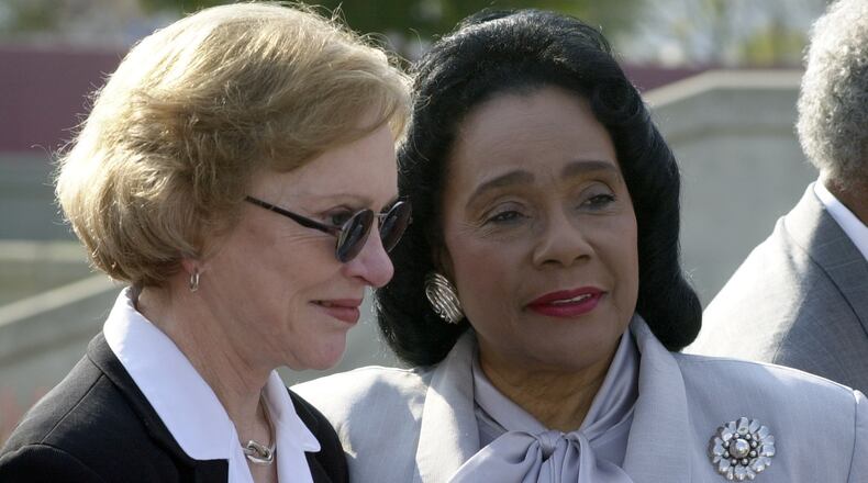 ATLANTA, GA. - Former U.S. first lady Rosalynn Carter (left) chats with Coretta Scott King (right) following ceremonies marking the 20th anniversary of the Martin Luther King, Jr. National Historic site and Preservation District on Auburn Ave. in Atlanta. Former U.S. Jimmy Carter was keynote speaker during the public ceremony. (CATHY SEITH/AJC FILE PHOTO)