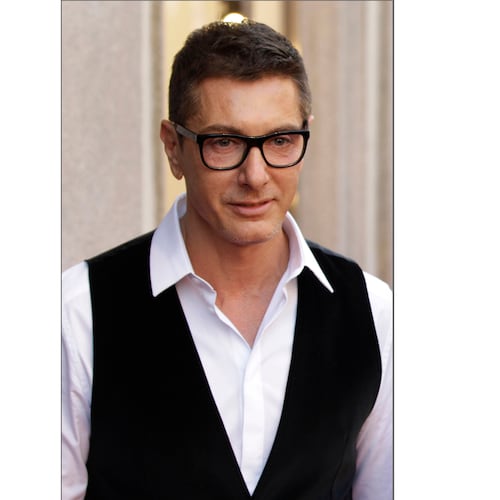 FILE - Italian fashion designer Stefano Gabbana arrives on the red carpet to attend the presentation of a portraits book ' Milan Fashion , soccer players portraits' sponsored by Dolce & Gabbana fashion brand, in downtown Milan, Italy, May 19, 2011. (AP Photo/Luca Bruno, File)