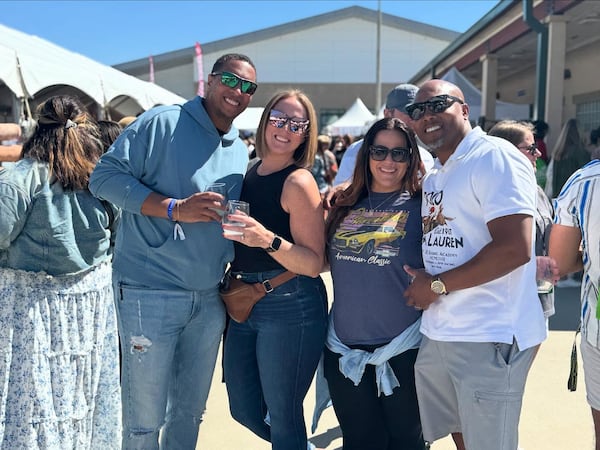 Patrons pose for a photograph at the Georgia Food + Wine Festival 2025.