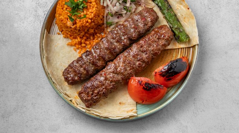 Adana kebab from the menu of Köz, a Mediterranean street food concept.