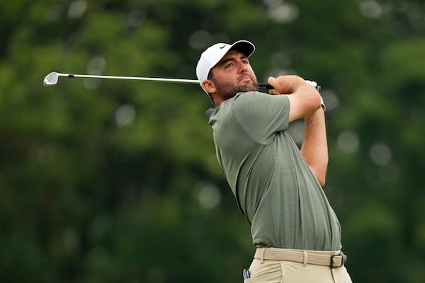 Scottie Scheffler tees off on the 16th hole during the second round of the U.S. Open golf tournament at Oakmont Country Club Friday, June 13, 2025, in Oakmont, Pa. (AP Photo/Carolyn Kaster)