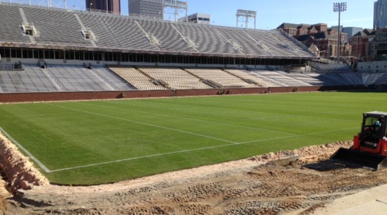 The artificial turf perimeter of Grant Field has been removed to make way for the installation of natural grass. (AJC photo by Ken Sugiura)
