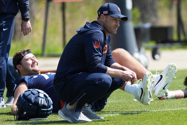 Chicago Bears head coach Ben Johnson watches players during the NFL football team's rookie camp in Lake Forest, Ill., Saturday, May 10, 2025. (AP Photo/Nam Y. Huh)