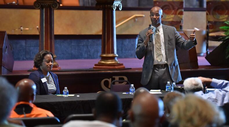 DeKalb County District Attorney candidates Sherry Boston and Robert James at a forum in Lithonia in early May. HYOSUB SHIN / HSHIN@AJC.COM