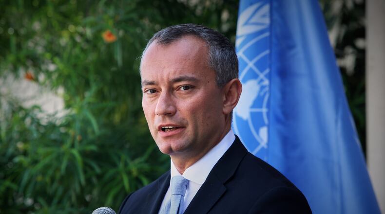 CORRECTED NAME SPELLING - FILE - United Nations Special Coordinator for the Middle East Peace Process Nickolay Mladenov attends a press conference at the (UNSCO) offices in Gaza City, Sept. 25, 2017. (AP Photo/Adel Hana, File)